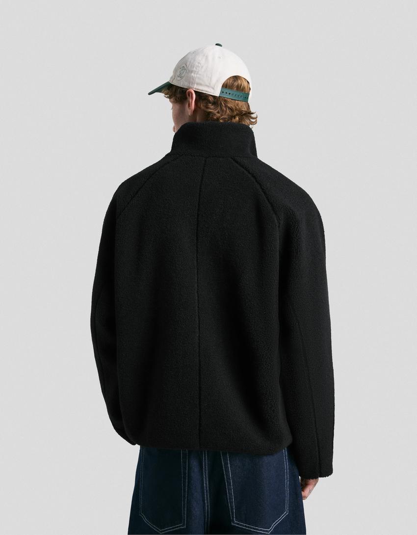 Veste à Zip en Fausse Fourrure
