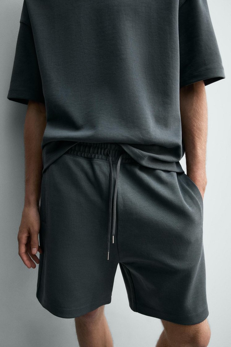 Zara SHORT DE JOGGING RELAXED FIT INTERLOCK — Bleu délavé