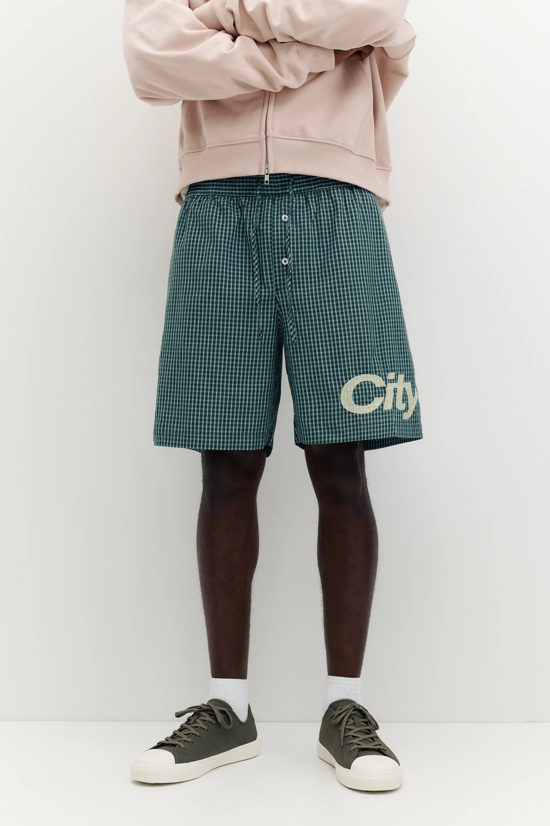 Checked graphic Bermuda shorts — Moss
