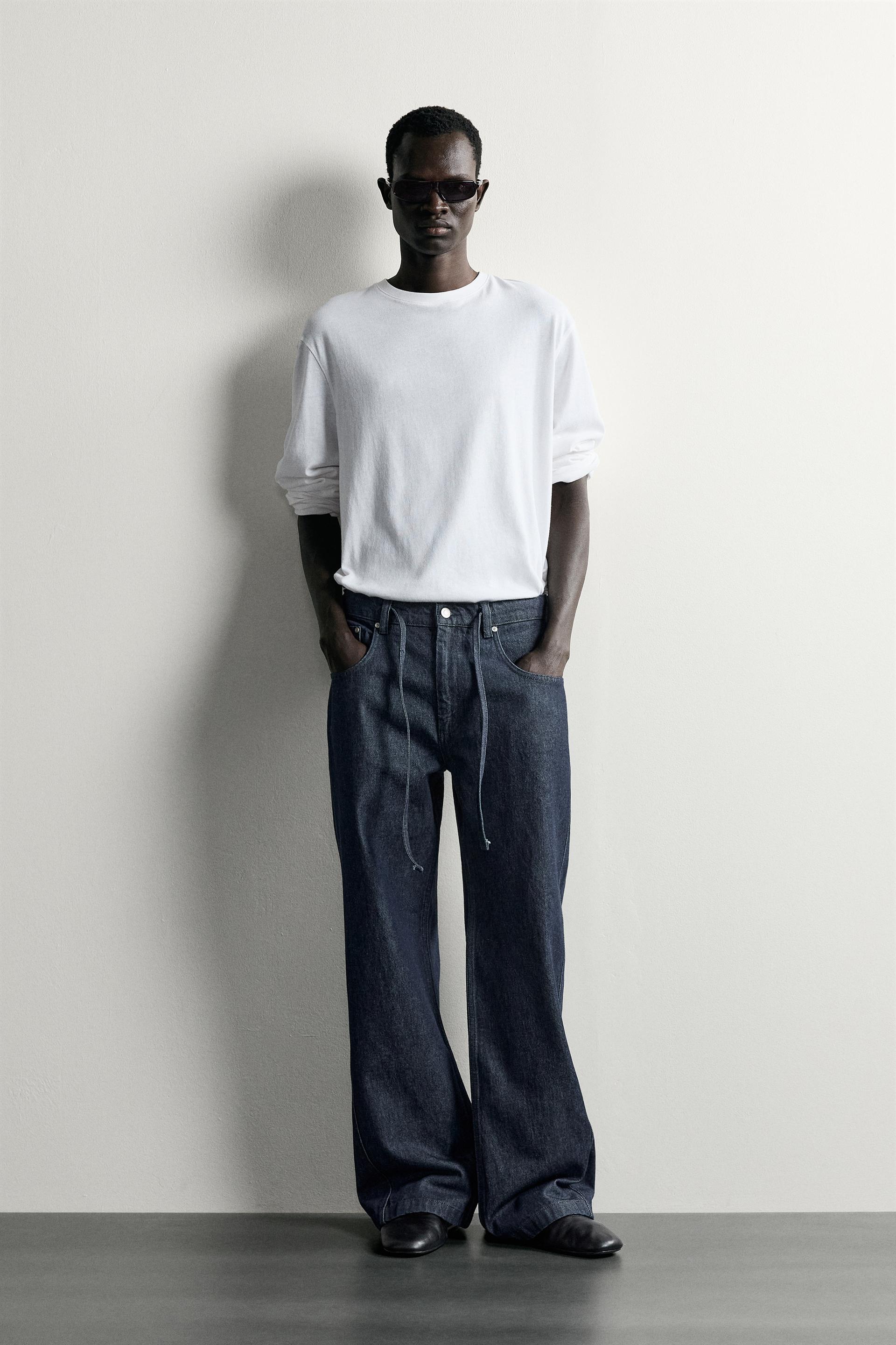 JEANS RELAXED FIT COSTURA GIRADA