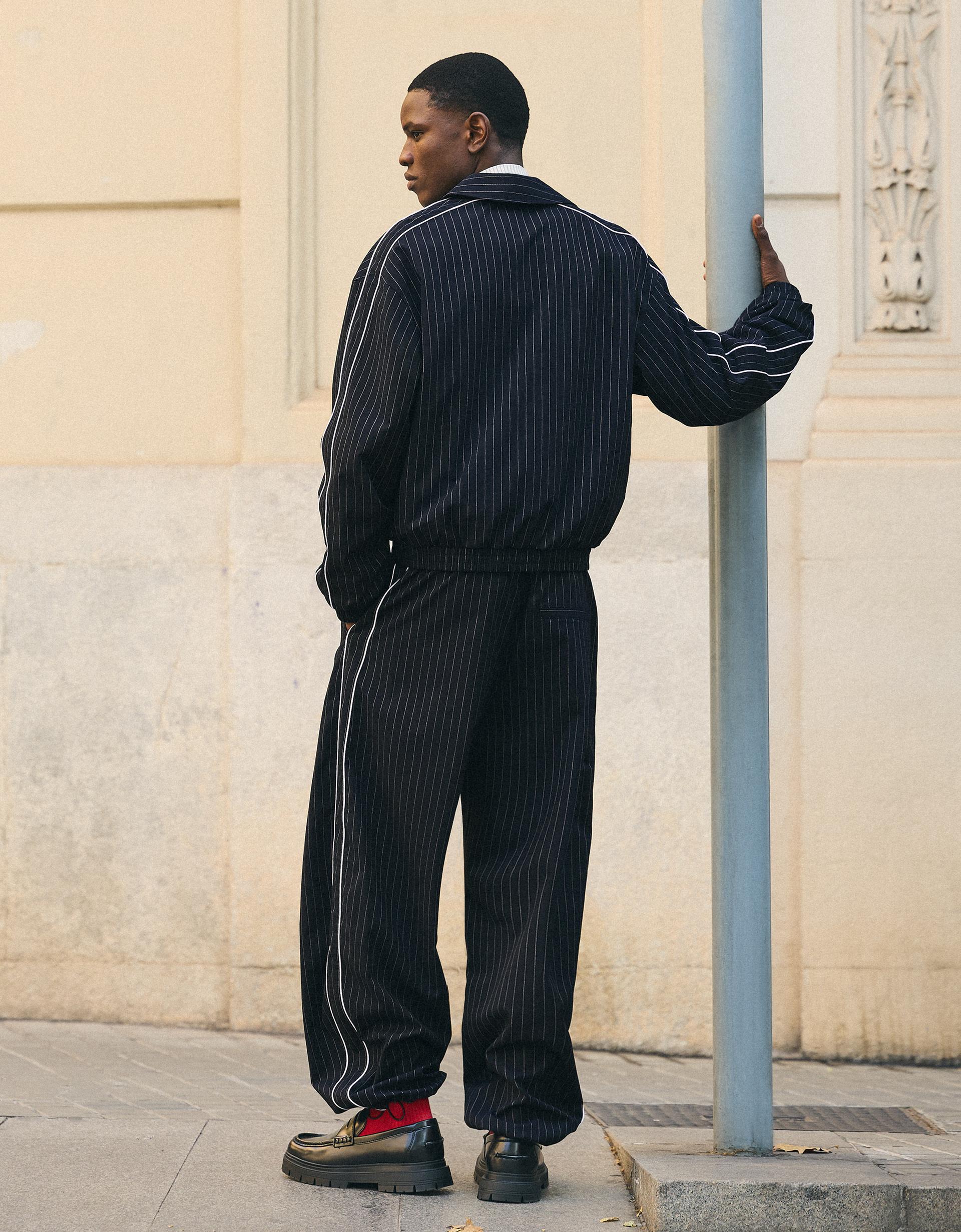 Pantalon super baggy fit à rayures tennis